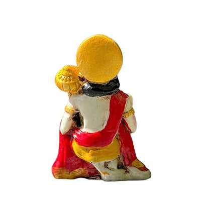 Handmade Lord Hanuman Ji seated idol made from polystone, symbolizing strength and protection, ideal for altars and home decor.