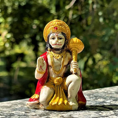 Handmade Lord Hanuman Ji seated idol made from polystone, symbolizing strength and protection, ideal for altars and home decor.