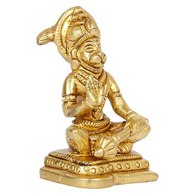 Handcrafted brass idol of Lord Hanumanji, featuring intricate details and a glossy gold finish, ideal for spiritual spaces and altars.