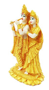 Handcrafted Lord Radha Krishna idol in vibrant colors, showcasing intricate details, ideal for home decor or altars.