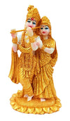 Handcrafted Lord Radha Krishna idol in vibrant colors, showcasing intricate details, ideal for home decor or altars.