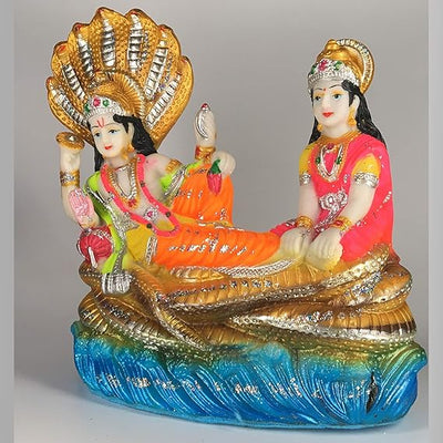 Handmade Lord Vishnu and Lakshmi idol crafted from polyresin, symbolizing prosperity and protection. Ideal for home, altar, or puja temple