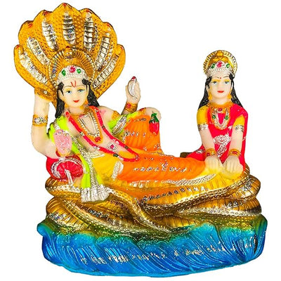Handmade Lord Vishnu and Lakshmi idol crafted from polyresin, symbolizing prosperity and protection. Ideal for home, altar, or puja temple