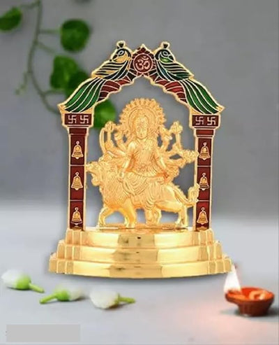Metal statue of Maa Durga, beautifully crafted with a golden finish, ideal for home decor, altars, or gifting.