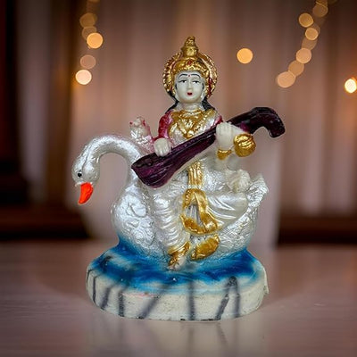 Handcrafted Marble Dust Saraswati idol, showcasing intricate details and serene beauty, symbolizing wisdom and knowledge.