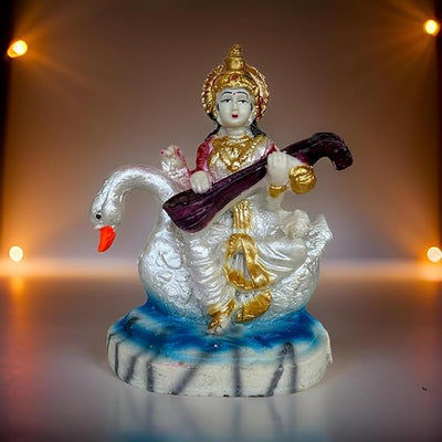 Handcrafted Marble Dust Saraswati idol, showcasing intricate details and serene beauty, symbolizing wisdom and knowledge.