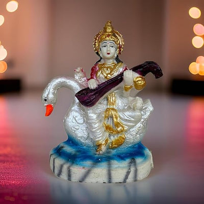 Handcrafted Marble Dust Saraswati idol, showcasing intricate details and serene beauty, symbolizing wisdom and knowledge.