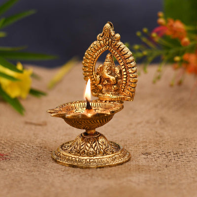 Handmade metal Ganesha idol, ideal for home temple decoration or as a gift. Dimensions: 5.1L x 5.1W x 11.4H cm, 250 grams