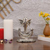 Handmade metal Ganesha idol, ideal for pooja room or as a collectible. Dimensions: 14L x 8.9W x 19.1H cm, 350 grams