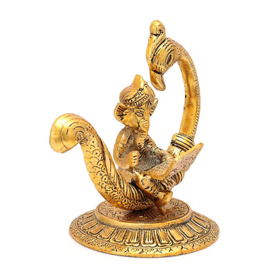 Handmade metal Ganesha idol, ideal for pooja room or as a collectible. Dimensions: 17.8L x 11.4W x 16.5H cm, 510 grams.