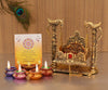 Handmade metal Ganesha idol for pooja room or altar, featuring intricate detailing. Dimensions: 16.5L x 16.5W x 8.9H cm, 500 grams.
