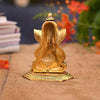 A small golden idol of Lord Ganesha, the Hindu god of wisdom and remover of obstacles, suitable for home decor.