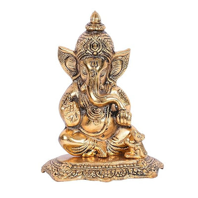 A small golden idol of Lord Ganesha, the Hindu god of wisdom and remover of obstacles, suitable for home decor.