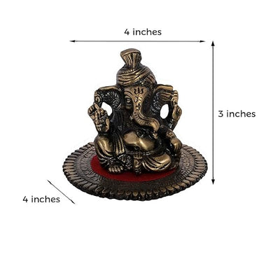 Intricately crafted metal Lord Ganesha statue on a round base, symbolizing wisdom and prosperity, perfect for home decor