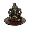 Intricately crafted metal Lord Ganesha statue on a round base, symbolizing wisdom and prosperity, perfect for home decor