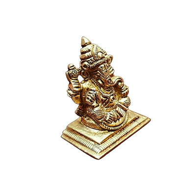 Handcrafted mini brass Ganesha idol for car dashboard, measuring 4 cm in height, 3.5 cm in length, and 2.5 cm in width, symbolizing blessings."