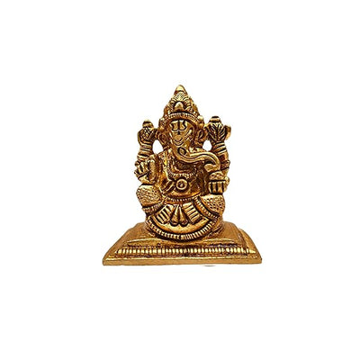 Handcrafted mini brass Ganesha idol for car dashboard, measuring 4 cm in height, 3.5 cm in length, and 2.5 cm in width, symbolizing blessings."