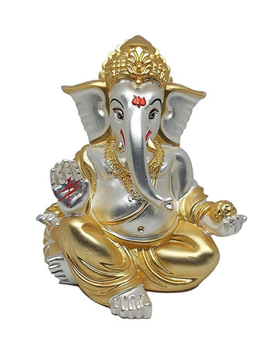 A beautifully handcrafted Lord Ganesha idol, featuring intricate details and a two-tone matte finish, perfect for home decor or car dashboards.
