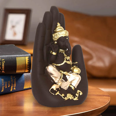 Handcrafted Palm Ganesha idol in polyresin, featuring a unique palm-resting pose, symbolizing wisdom and prosperity, ideal for home decor.