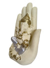 Handcrafted Palm Ganesha idol in polyresin, featuring a tranquil design perched on a palm, symbolizing wisdom and harmony for home decor.