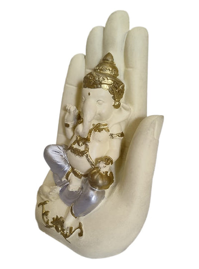 Handcrafted Palm Ganesha idol in polyresin, featuring a tranquil design perched on a palm, symbolizing wisdom and harmony for home decor.