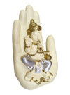 Handcrafted Palm Ganesha idol in polyresin, featuring a tranquil design perched on a palm, symbolizing wisdom and harmony for home decor.