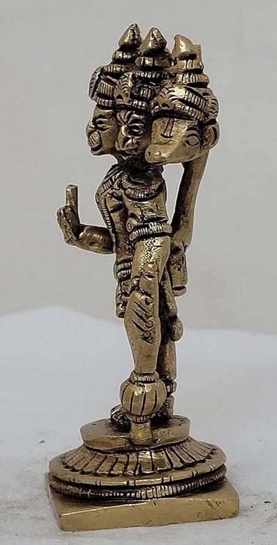 Handmade brass idol of Panchamukhi Hanuman, featuring five faces representing divine protection, suitable for altars and home decor.