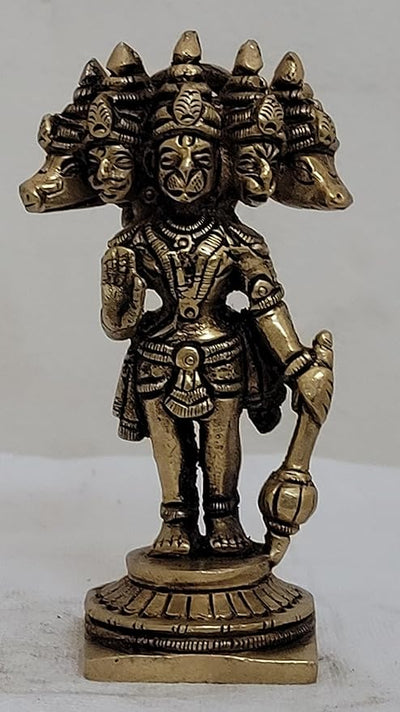 Handmade brass idol of Panchamukhi Hanuman, featuring five faces representing divine protection, suitable for altars and home decor.