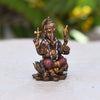 Handmade plastic Lord Ganesha idol, ideal for altar decor or as a gift. Dimensions: 7.9L x 4.8W x 4.8H cm, 180 grams.