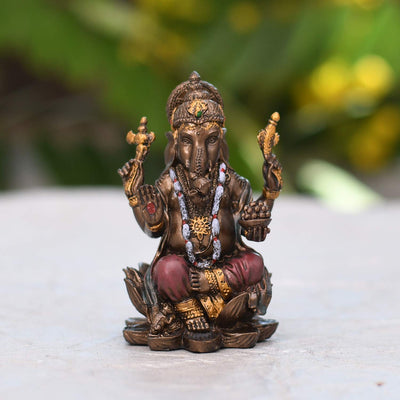 Handmade plastic Lord Ganesha idol, ideal for altar decor or as a gift. Dimensions: 7.9L x 4.8W x 4.8H cm, 180 grams.