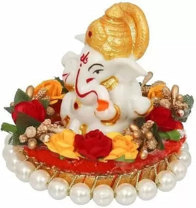 Handcrafted Polyresin Ganesha idol, 9x9x8 cm, perfect for home altar or car dashboard. Symbol of wisdom, prosperity, and good fortune.