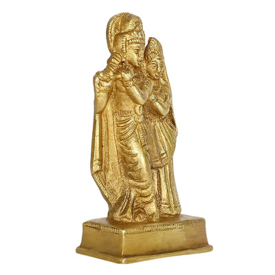 Brass Radha Krishna idol, intricately designed to symbolize eternal love, ideal for home decor or altar placement.