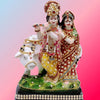 Handmade Radha Krishna cow idol made from durable polyresin, ideal for home decor, altars, and spiritual spaces.