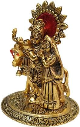 Handcrafted metal statue of Radha and Krishna in an embrace, accompanied by a serene cow, symbolizing divine love and traditional craftsmanship.
