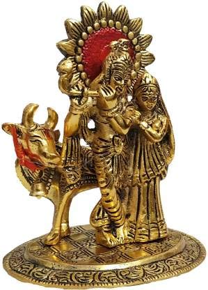 Handcrafted metal statue of Radha and Krishna in an embrace, accompanied by a serene cow, symbolizing divine love and traditional craftsmanship.