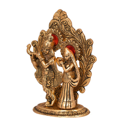 Handcrafted metal statue of Radha and Krishna playing the flute, measuring 11.4L x 5.1W x 17.8H cm, symbolizing love and devotion