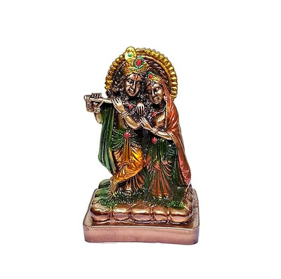 Handmade Radha Krishna resin statue depicting the divine couple in a blissful embrace, ideal for home, office, or temple decor.