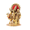 Handcrafted metal statue of Radha and Krishna in an embrace, accompanied by a serene cow, symbolizing divine love and traditional craftsmanship.