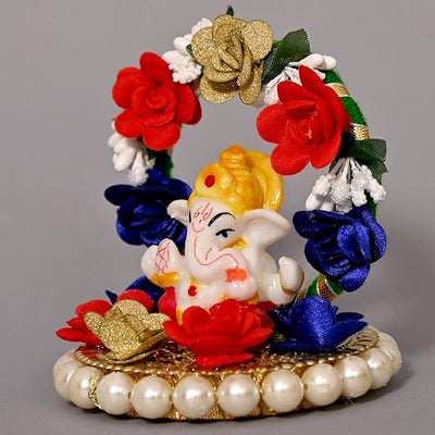 Handcrafted resin Ganesha idol, 30.48x27.94x22.86 cm, perfect for home altar or car dashboard. Symbolizes prosperity, wisdom, and good fortune.
