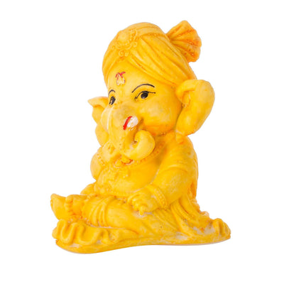 Handcrafted 300g resin Ganesha idol for car dashboard or home décor, featuring intricate details in a compact 3x3x2 cm size.