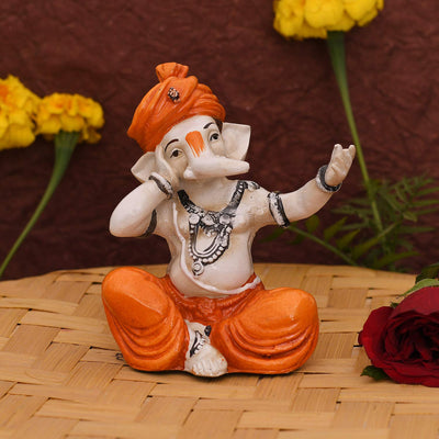 Handmade resin Ganesha idol, ideal for pooja room or as a collectible. Dimensions: 7.6L x 5.1W x 12.7H cm, 350 grams