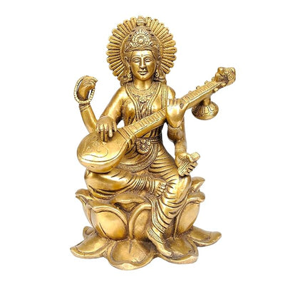 Handmade brass Saraswati idol, intricately designed, depicting the goddess of knowledge and arts seated gracefully on a swan.