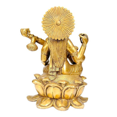 Handmade brass Saraswati idol, intricately designed, depicting the goddess of knowledge and arts seated gracefully on a swan.