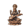 Handmade copper Saraswati idol, intricately designed, depicting the goddess of knowledge and arts with exquisite detailing.