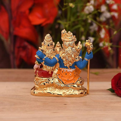 Handcrafted ceramic set of Shiva Parivar, including Lord Shiva, Goddess Parvati, and Lord Ganesha, with gold plating for a stunning appearance.