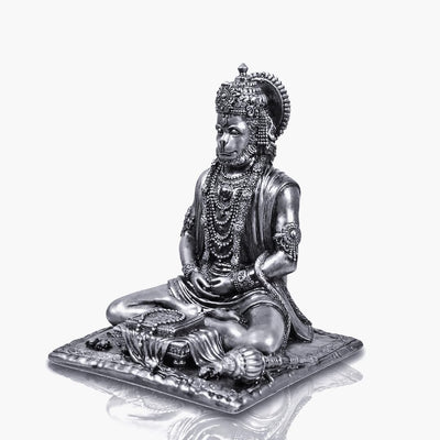 A 4.5-inch Silver Bahubali Hanuman statue, handcrafted from resin, symbolizing strength and inner peace, ideal for home decor or spiritual spaces.