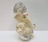 Handcrafted Silver Chandan Ganesha idol with intricate silver jewelry, symbolizing prosperity and wisdom, ideal for home decor and altars.