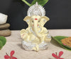 Handcrafted Silver Chandan Ganesha idol with intricate silver jewelry, symbolizing prosperity and wisdom, ideal for home decor and altars.