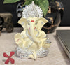 Handcrafted Silver Chandan Ganesha idol with intricate silver jewelry, symbolizing prosperity and wisdom, ideal for home decor and altars.