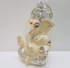 Handcrafted Silver Chandan Ganesha idol with intricate silver jewelry, symbolizing prosperity and wisdom, ideal for home decor and altars.